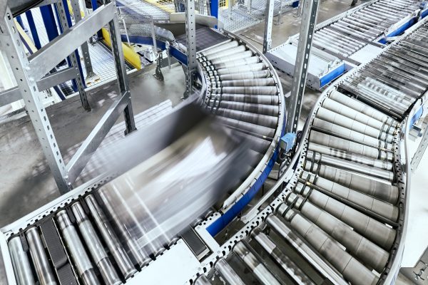 Transportation line conveyor system with baggage in motion.
